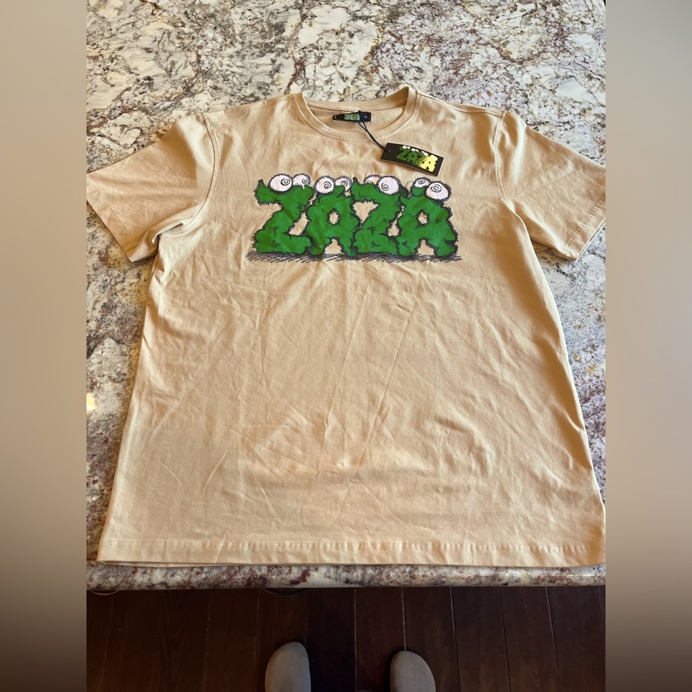 ZAZA Graphic Tee
Size:XL